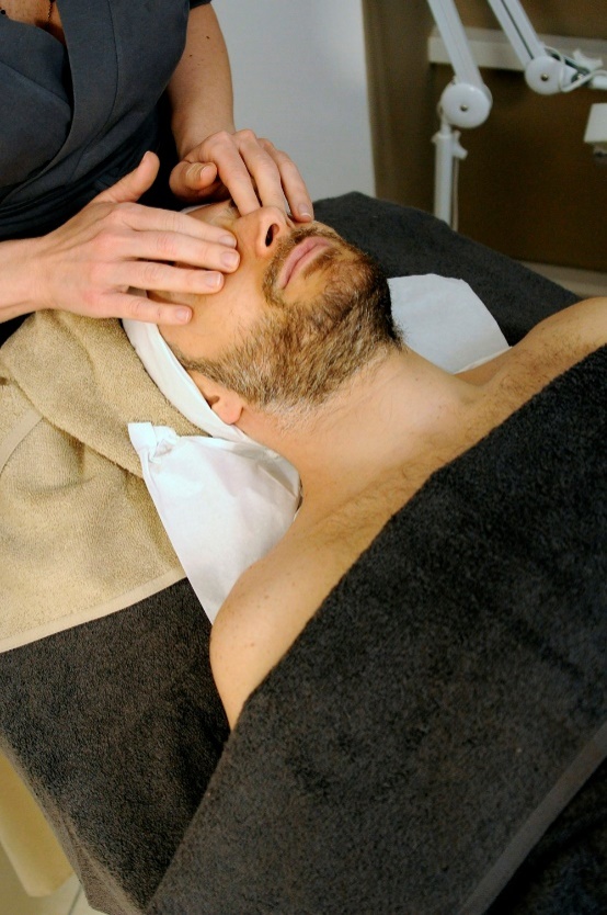 Man peacefully sleeping during a massage