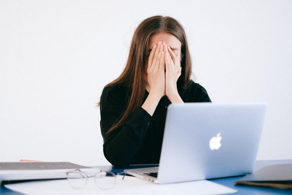  A woman with her hands on her face