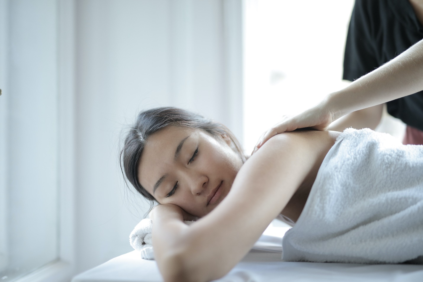 A woman getting a full-body massage