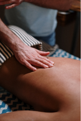 A person getting a full body massage