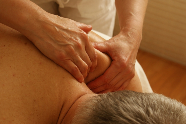 A person getting deep tissue massage