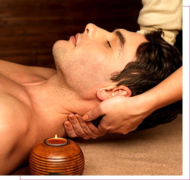 A person getting an in-room massage service
